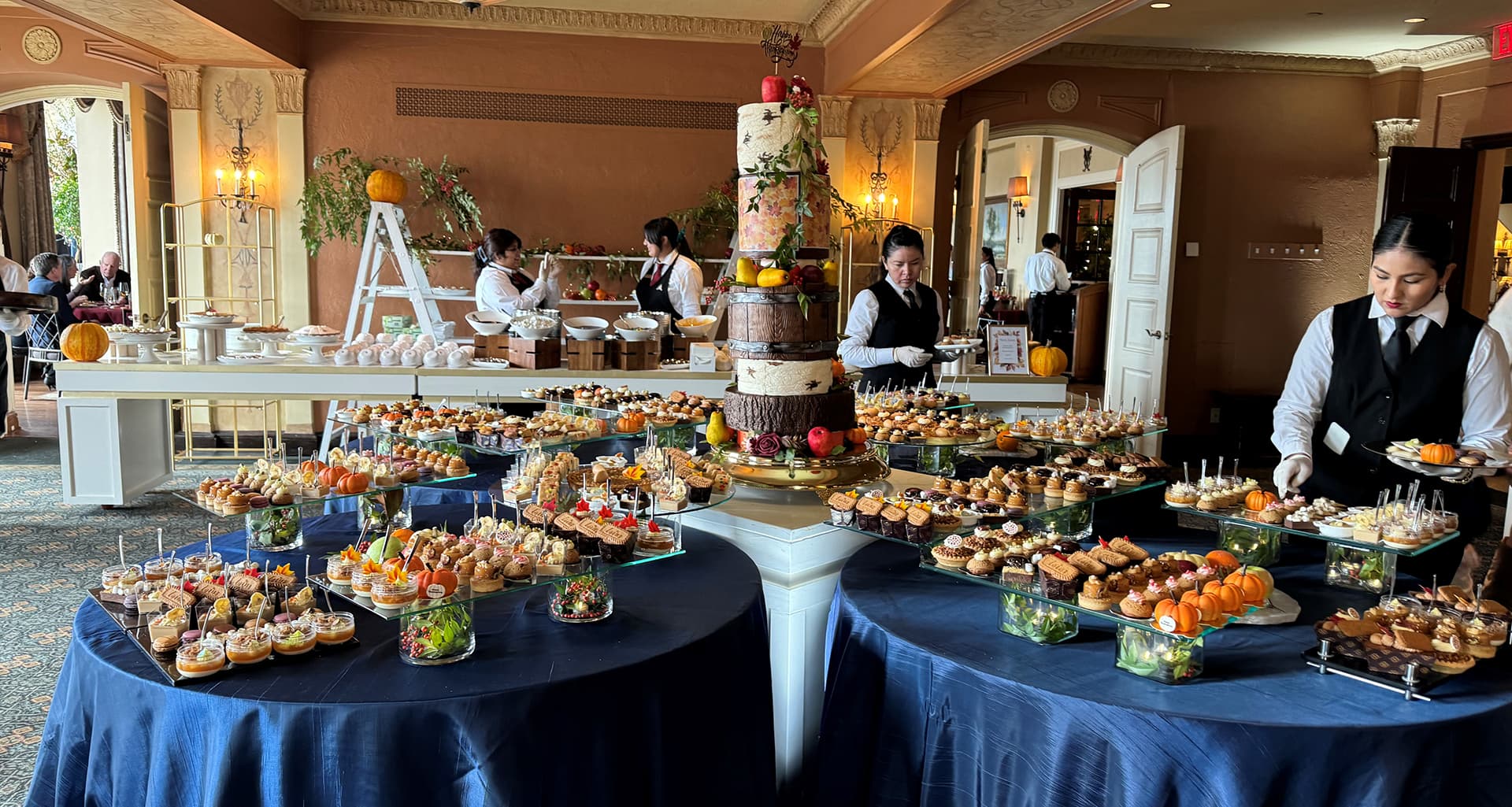 Professional XpresStaffing team members providing exceptional catering service at an elegant event